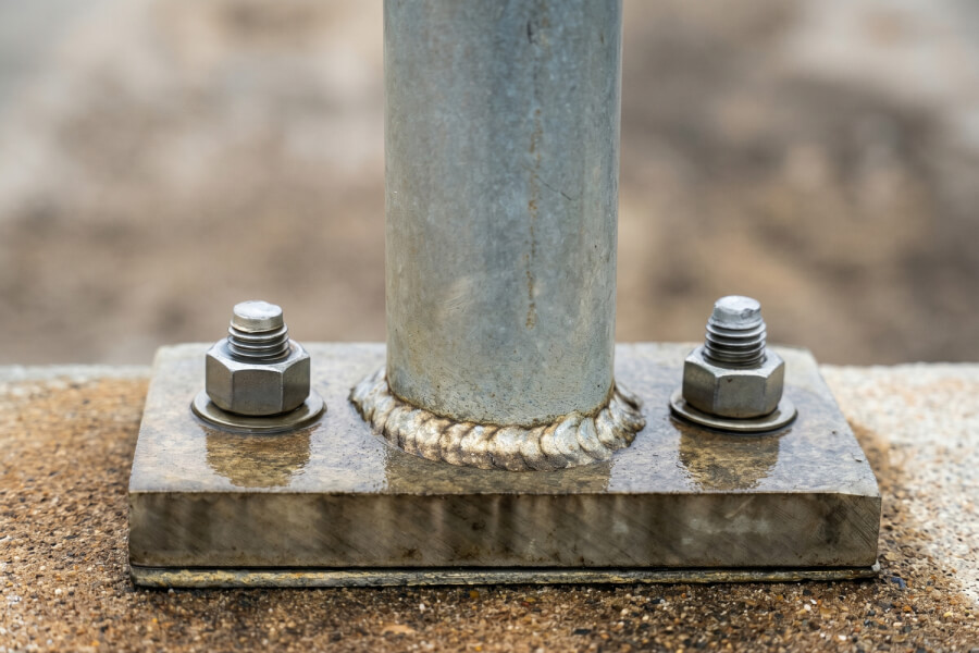 Floor anchored post base