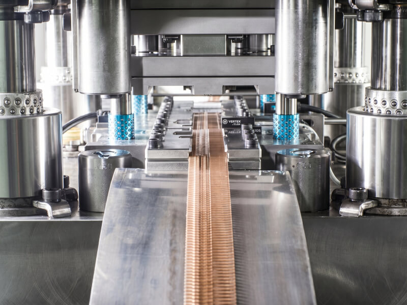 High-speed progressive die stamping for mass production of brass parts