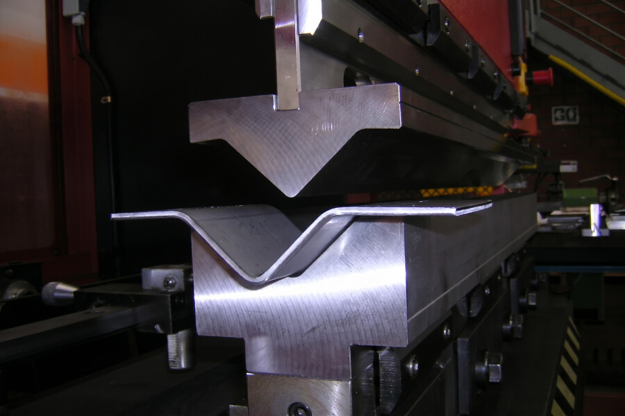 Precision CNC press brake bending brass sheet metal with controlled bend radius