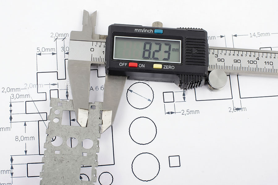 Verifying dimensional tolerances with a digital caliper