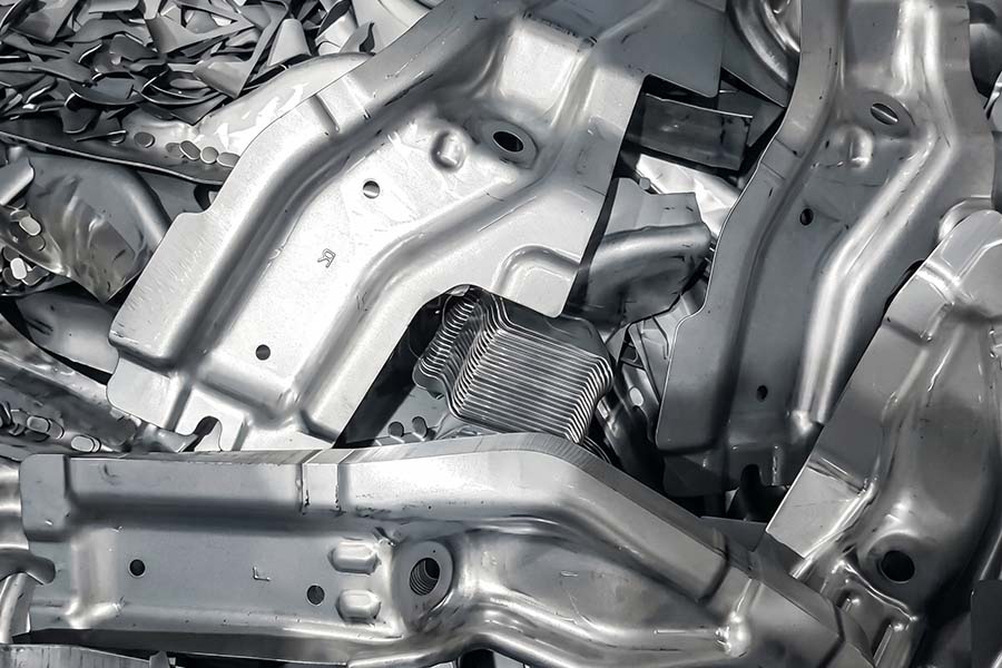 High-volume production of robotic sheet metal components
