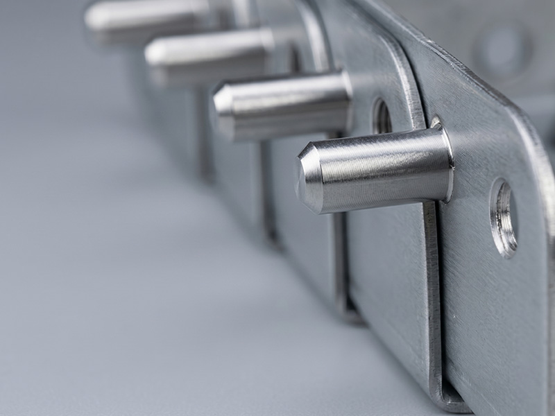 Installed flush-head clinching studs