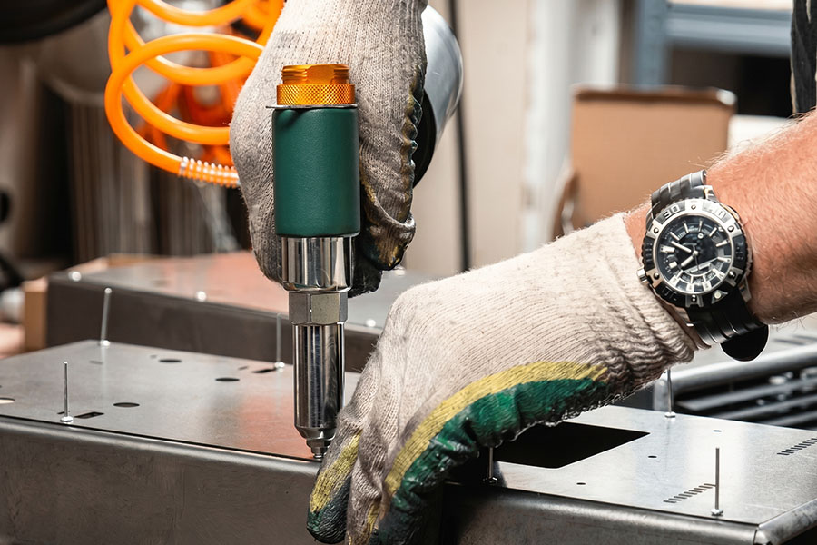 Pneumatic riveting on sheet metal