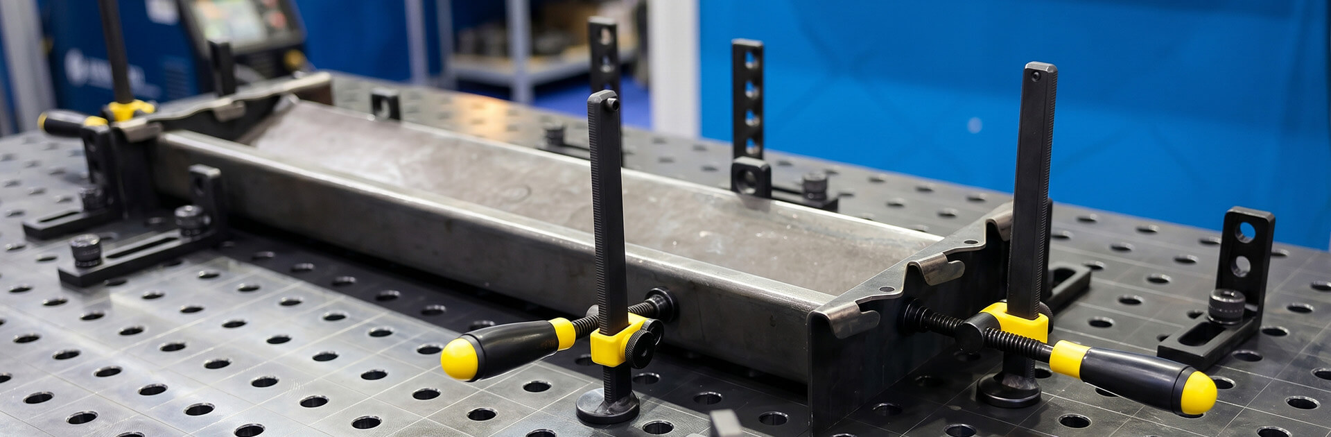 Precision welding fixtures for zero-distortion enclosure assembly