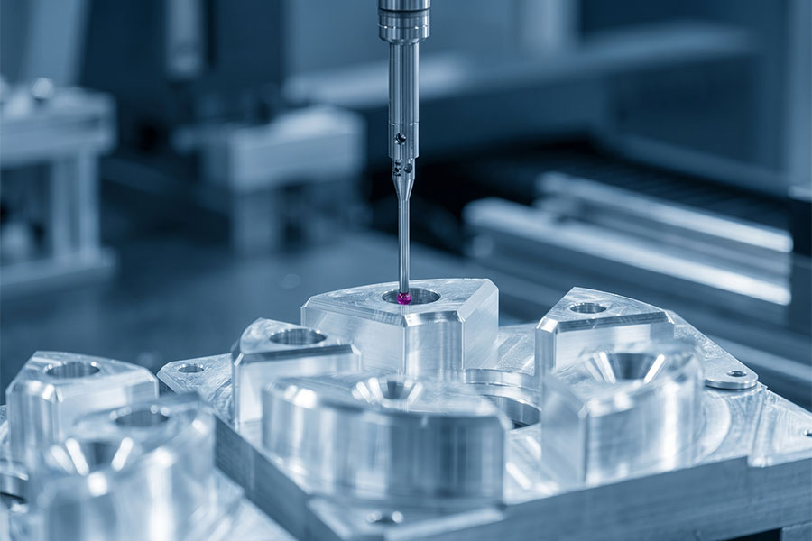 CMM probe inspecting precision metal component dimensions