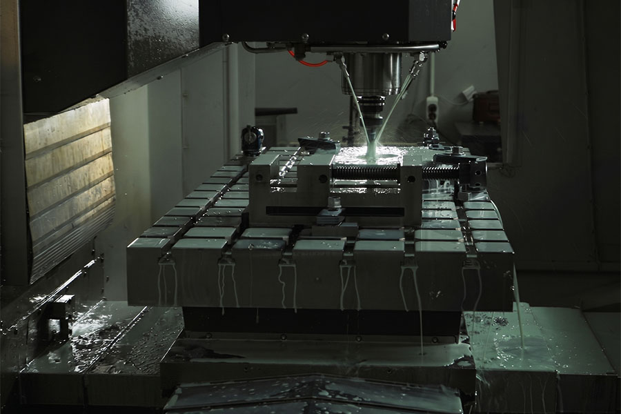 Large-envelope CNC mill machining a heavy welded structural frame