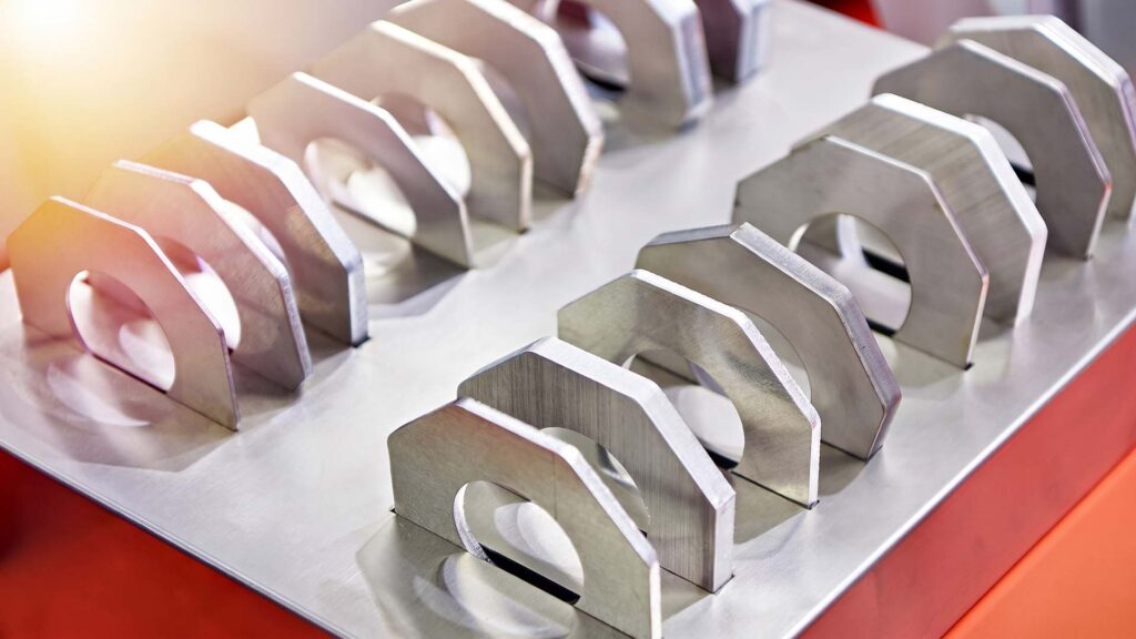 Custom 6061 aluminum structural brackets with punched holes