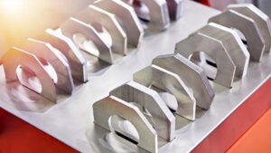 Custom 6061 aluminum structural brackets with punched holes