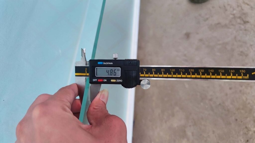 Digital caliper measuring sheet metal flange precision