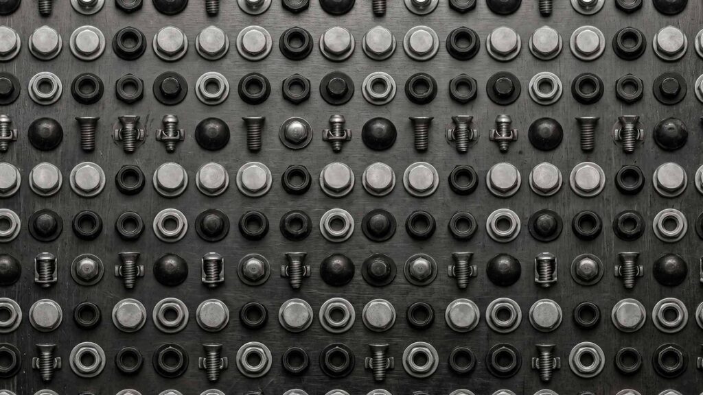 Grid of various sheet metal fasteners and rivets