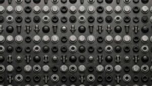 Grid of various sheet metal fasteners and rivets