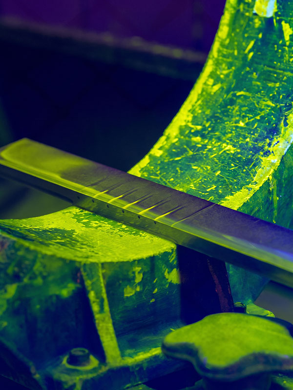 Metal part submerged in chemical electroplating bath