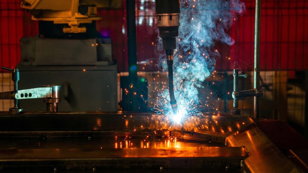 Automated robotic welding cell for sheet metal
