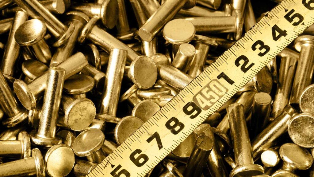 Brass solid rivets with a measuring tape