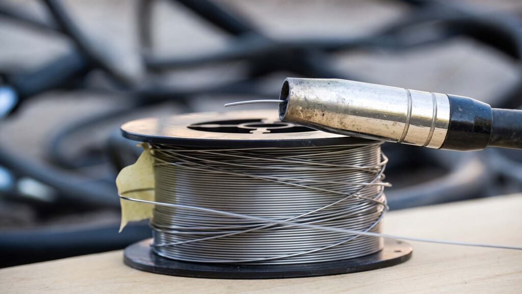 MIG welding torch and aluminum wire spool
