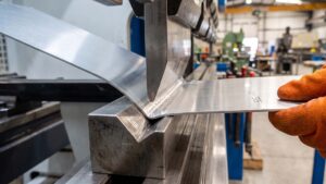 Precision press brake tooling bending aluminum sheet close-up