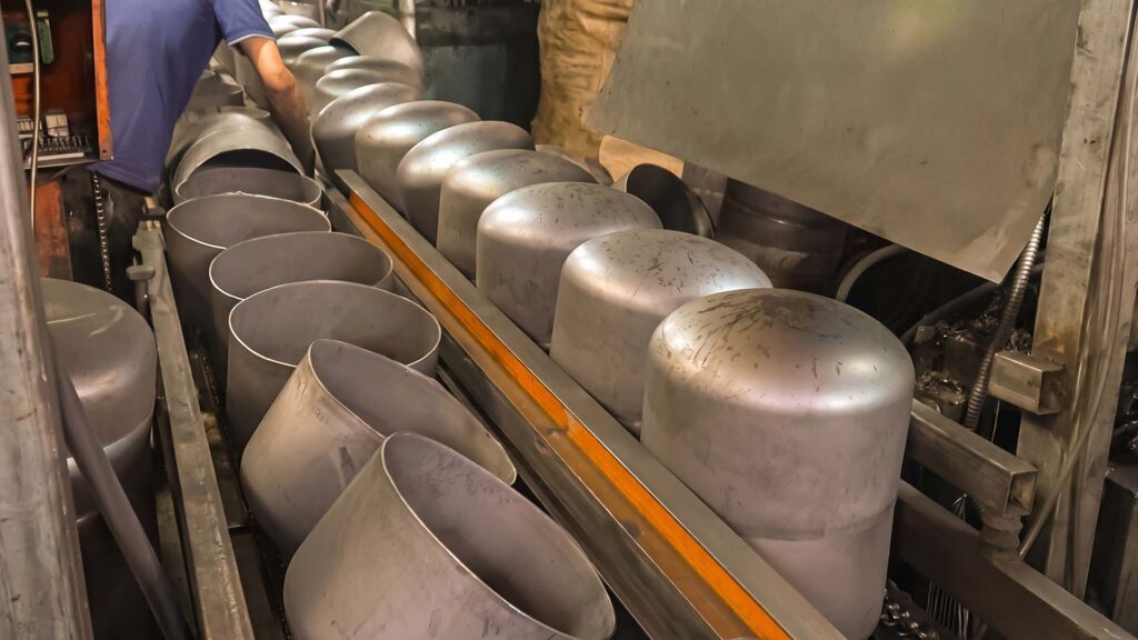 Seamless deep drawn metal shells on production line