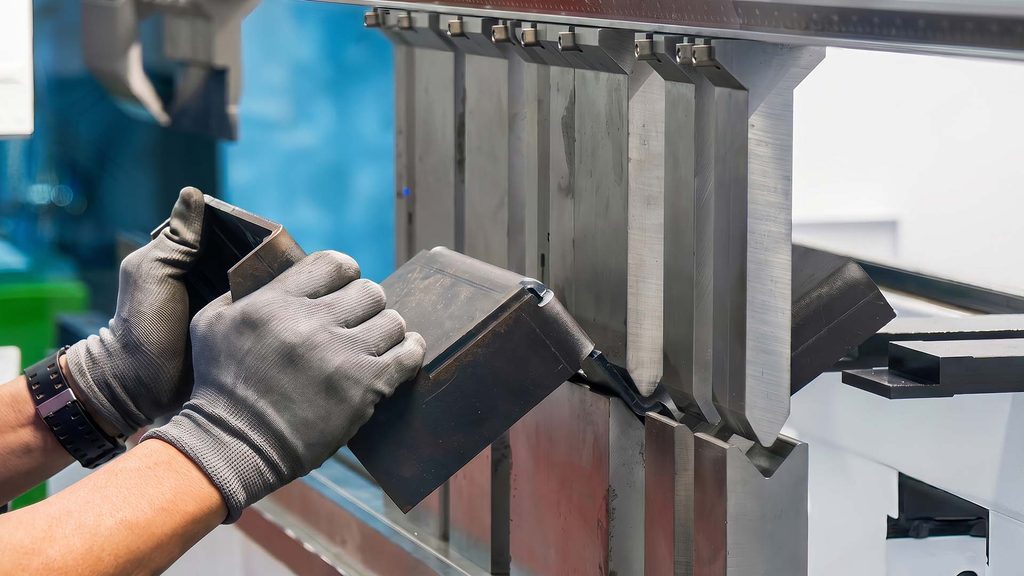 Sheet metal box showing corner flange intersections