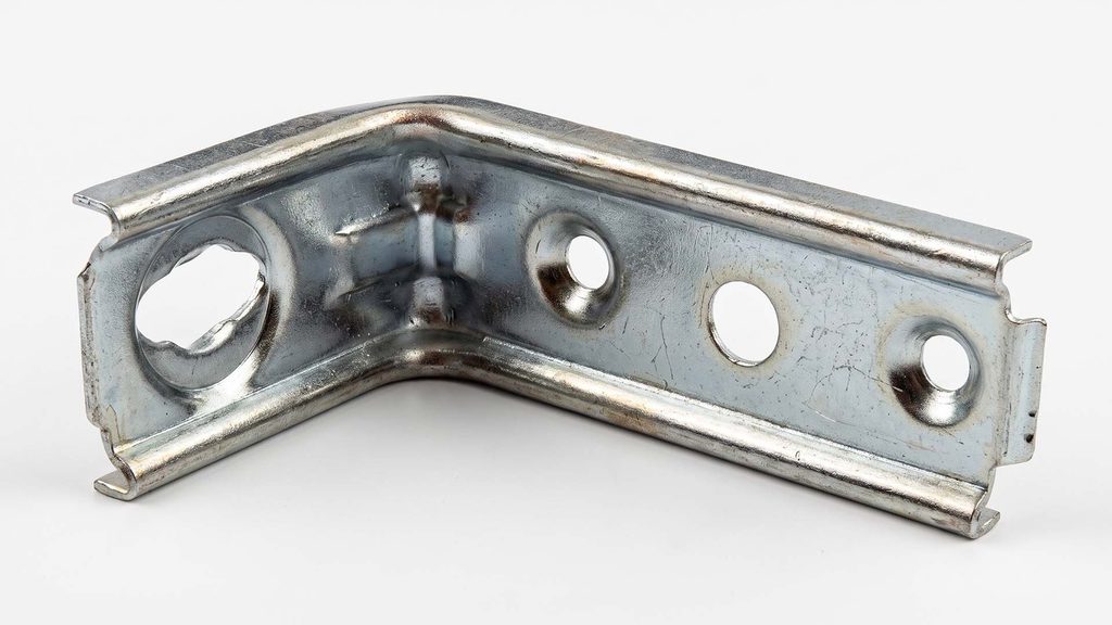 Sheet metal bracket with holes near bend