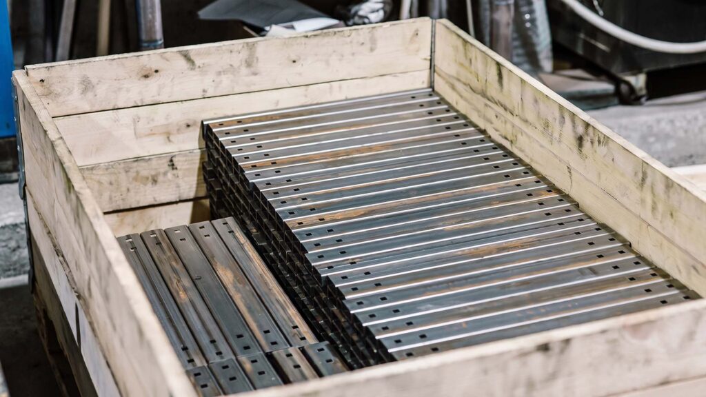 Sheet metal parts packed in wooden export crate