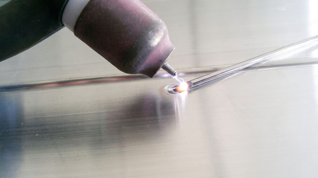 TIG welding torch fusing sheet metal seam
